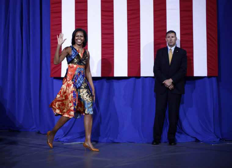 Image: U.S. first lady Michelle Obama participates in an election campaign rally to re-elect her husband Barack Obama at the University of Mary Washington in Fredericksburg